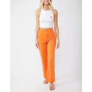 NEW RUSTY the secret cord pants in orange